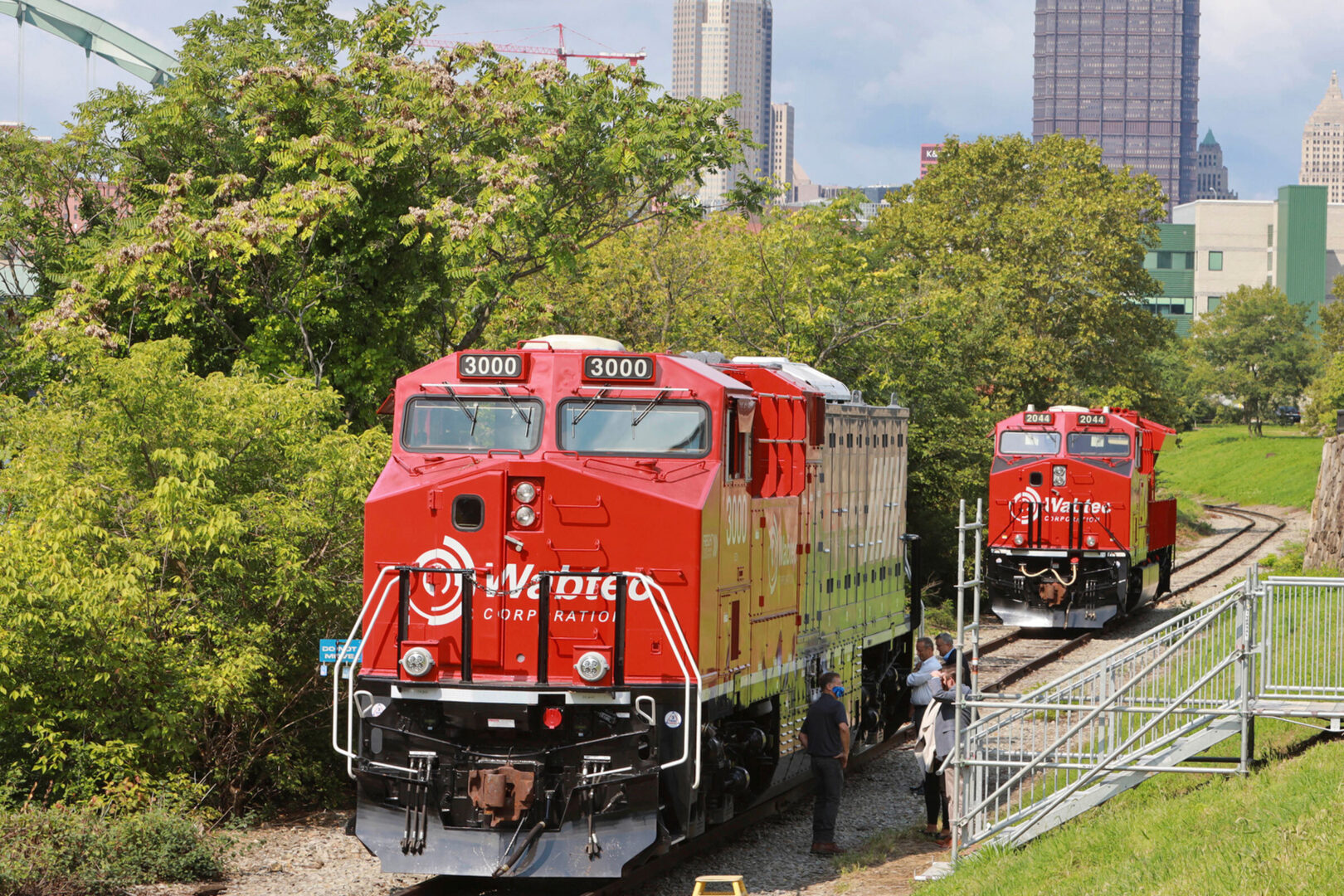 Wabtec’s FLXdrive battery-electric locomotives are seen at the Freight 2030 event on Sept. 10, 2021, in Pittsburgh.