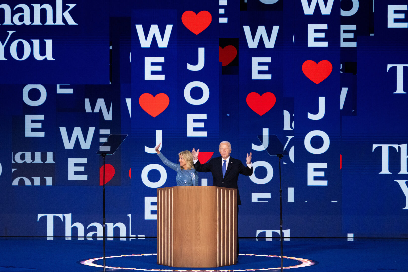 President Joe Biden and first lady Jill Biden wave to the crowd at the 2024 Democratic National Convention at the United Center in Chicago on Monday.