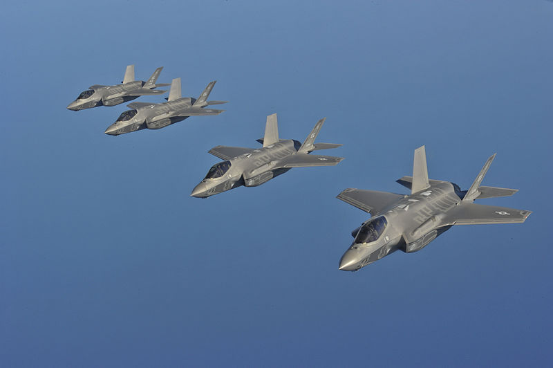 U.S. Air Force F-35A Lightning II fighter jets perform an aerial refueling mission off the coast of northwest Florida in 2013. The Lockheed Martin-made jets contain specialty aluminum products the Trump administration is concerned as it studies the needs a wartime military buildup would bring. (U.S. Air Force photo/Master Sgt. Donald R. Allen/via Wikimedia Commons)