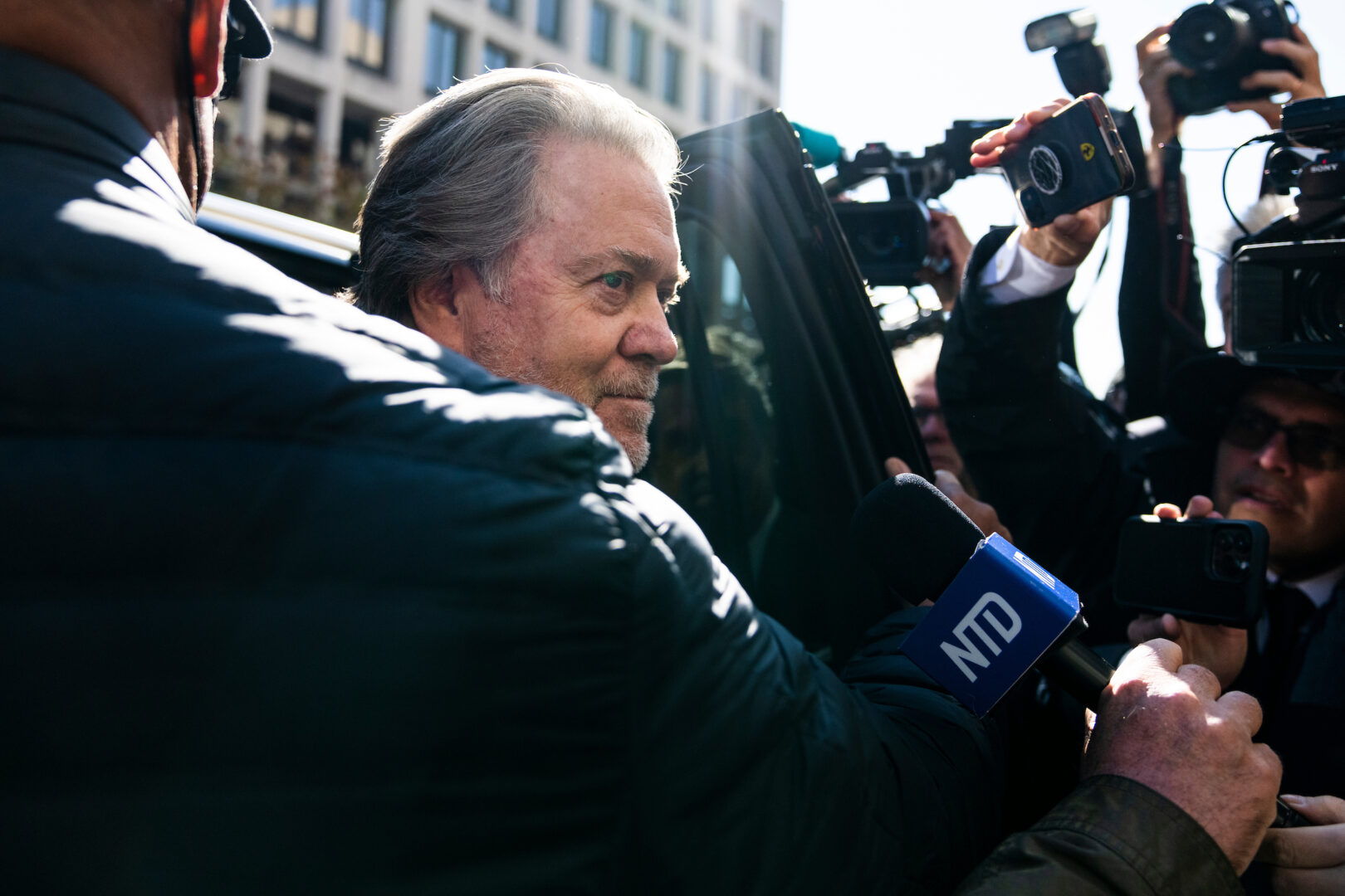 Steve Bannon, former adviser to President Donald Trump, addresses the media outside federal court in Washington in 2022 after being sentenced to four months in prison. 