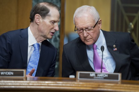 Wyden, left, earlier shepherded fast-track through committee, but balked at advancing it on the floor. (Tom Williams/CQ Roll Call)