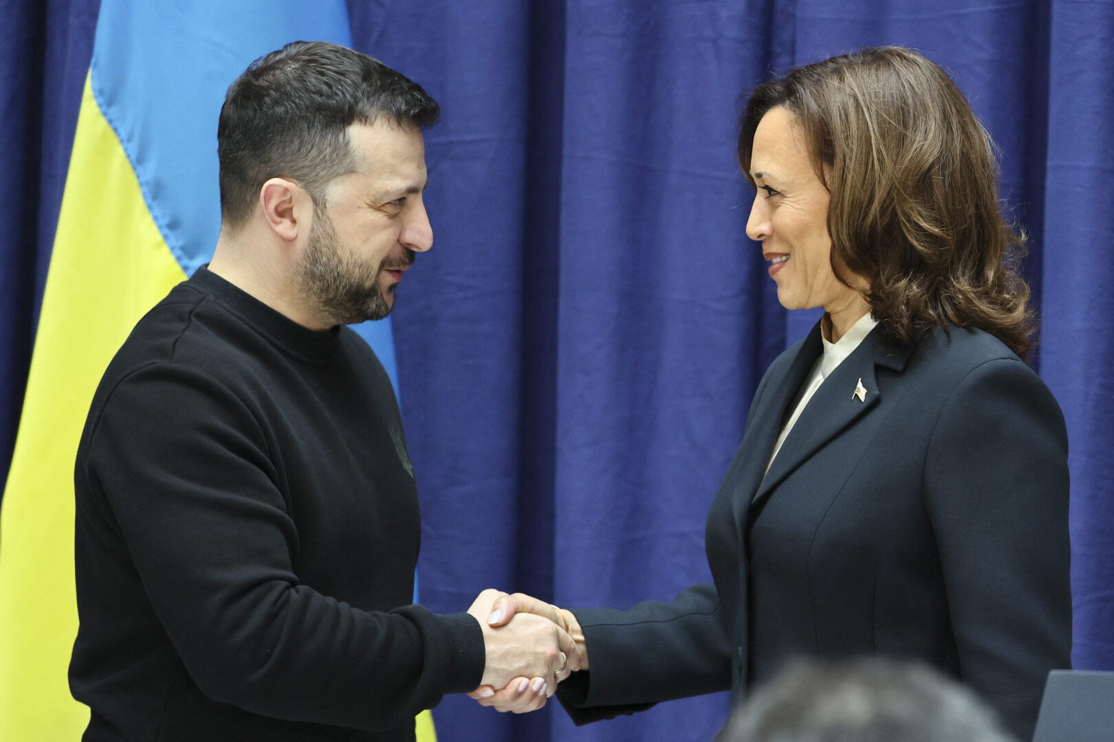 Ukrainian President Volodymyr Zelenskyy and Vice President Kamala Harris shake hands at the Munich Security Conference in Germany on Feb. 17. 