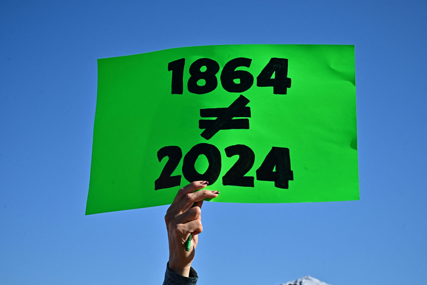 Pro-abortion rights demonstrators rally in Scottsdale, Ariz. on April 15. Officials in Arizona and Missouri certified proposed amendments in the states this week.