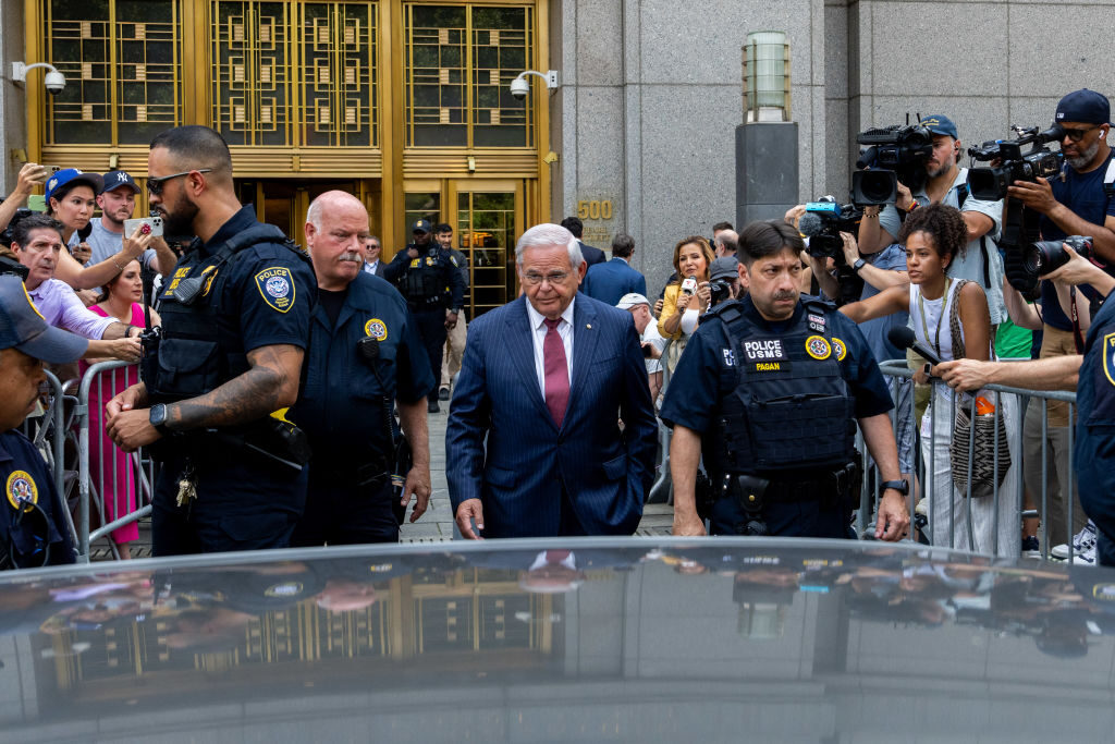 Sen. Bob Menendez, D-N.J., exits Manhattan federal court Tuesday in New York City after a jury found him guilty on all 16 counts in a sweeping corruption case. 