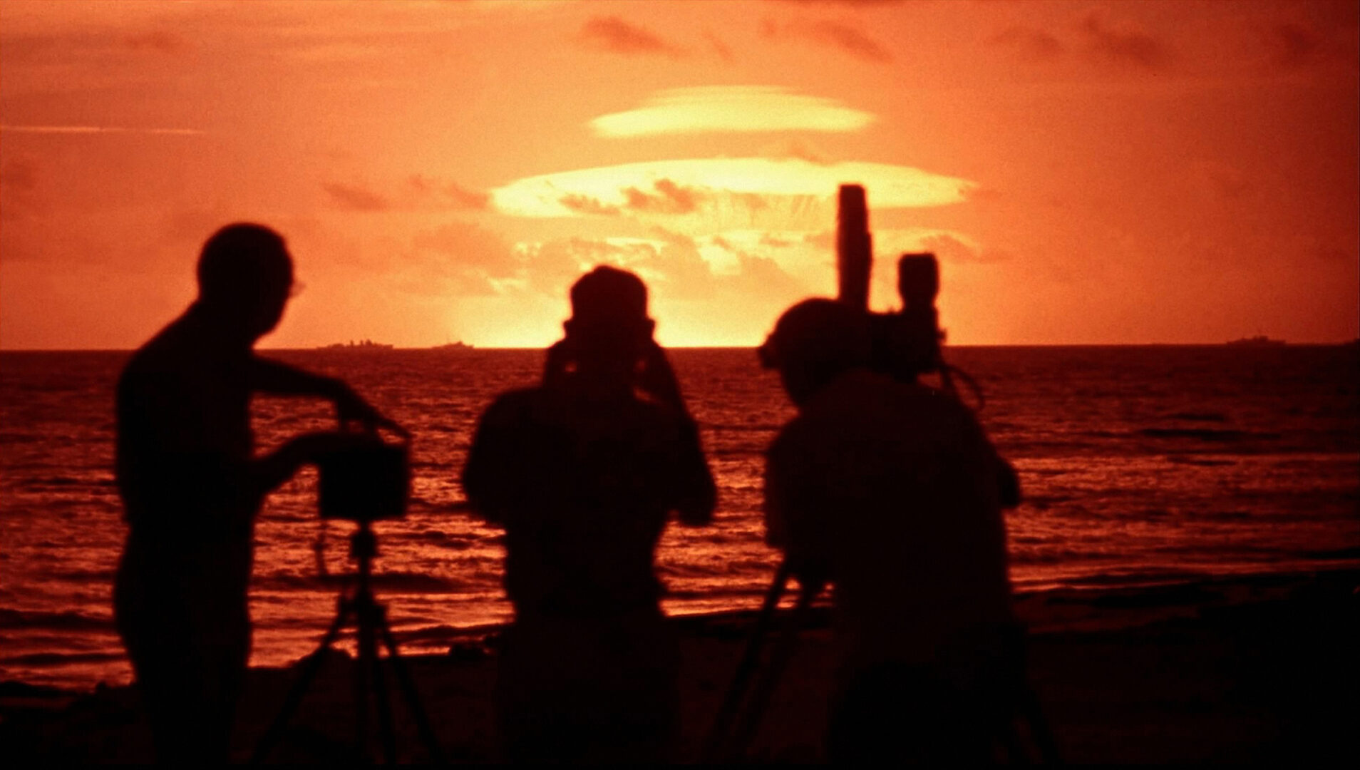 Photographers and camera crew on Enewetak Atoll during Koa nuclear test as part of Operation Hardtack, a series of 35 nuclear tests conducted by the United States in 1958 at the Pacific Proving Grounds.