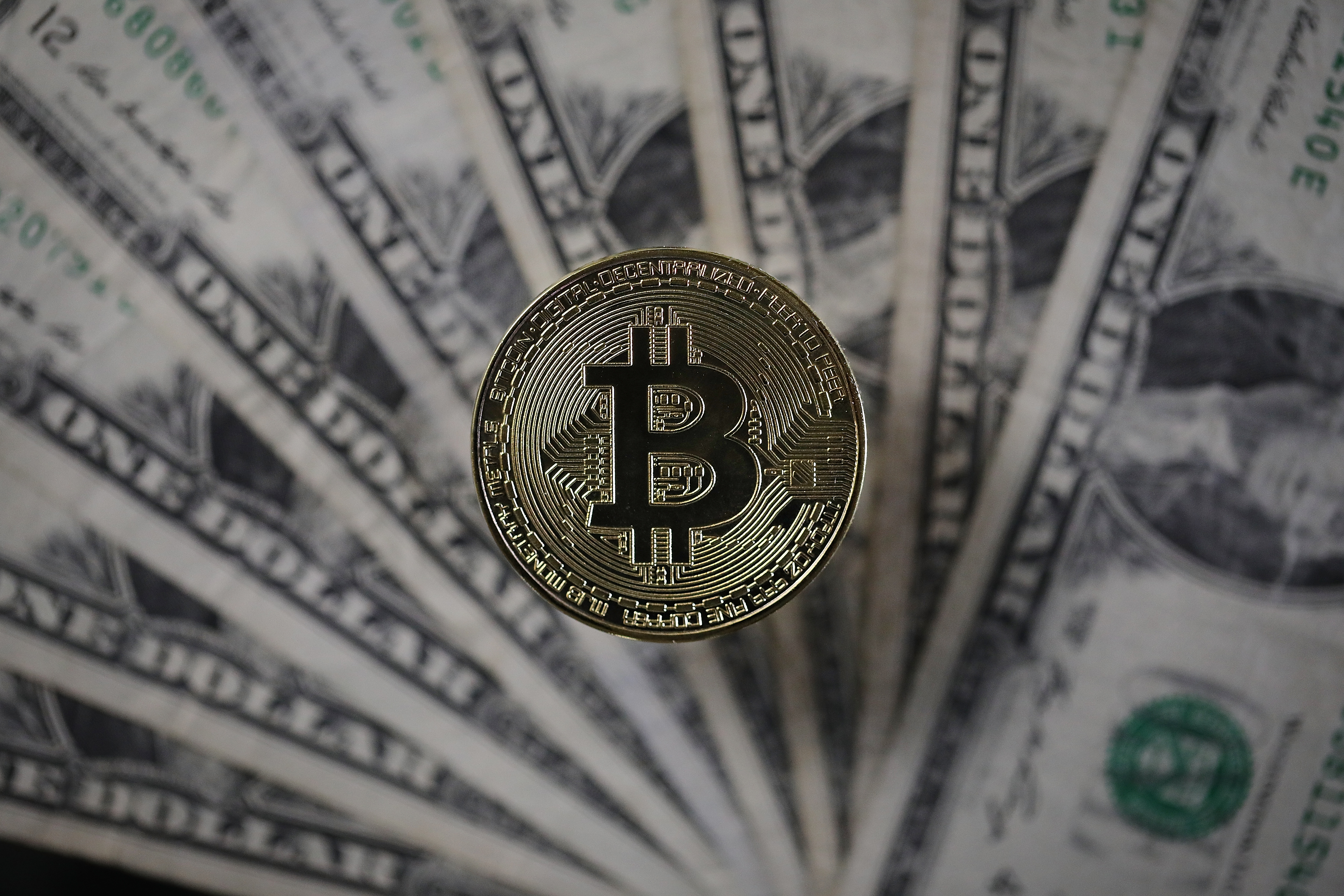 Bitcoin and other cryptocurrencies are legally considered commodities and occupy the same category as gold or oil, which are considered “exempt.” (Dan Kitwood/Getty Images file photo)