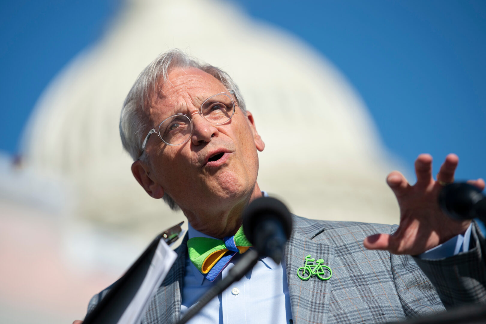 Rep. Earl Blumenauer, seen here in 2019, is known for wearing brightly colored bike pins on his lapel. 