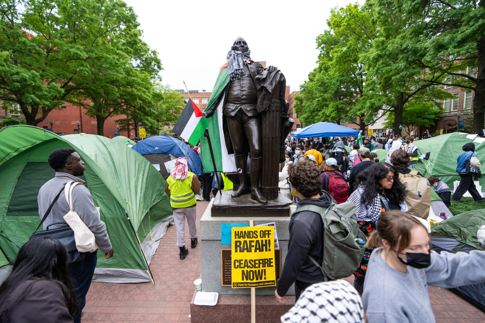 New data from the latest Winning the Issues survey explores how voters think colleges and universities have handled pro-Palestinian protests. Above, an encampment is seen at George Washington University on April 25.