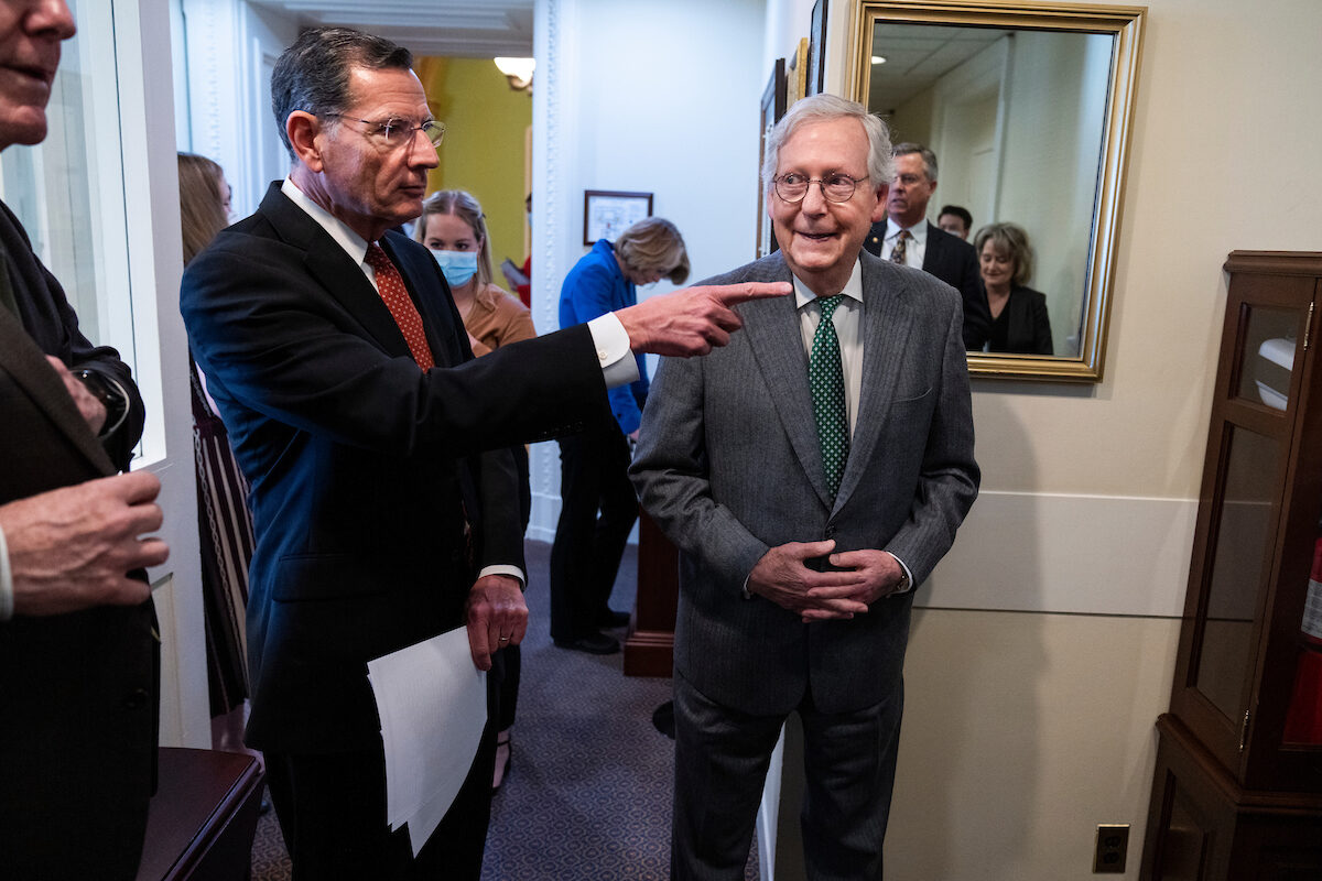 Senate GOP Conference Chair John Barrasso of Wyoming, left, with Senate Minority Leader Mitch McConnell, R-Ky., on Nov. 18. 