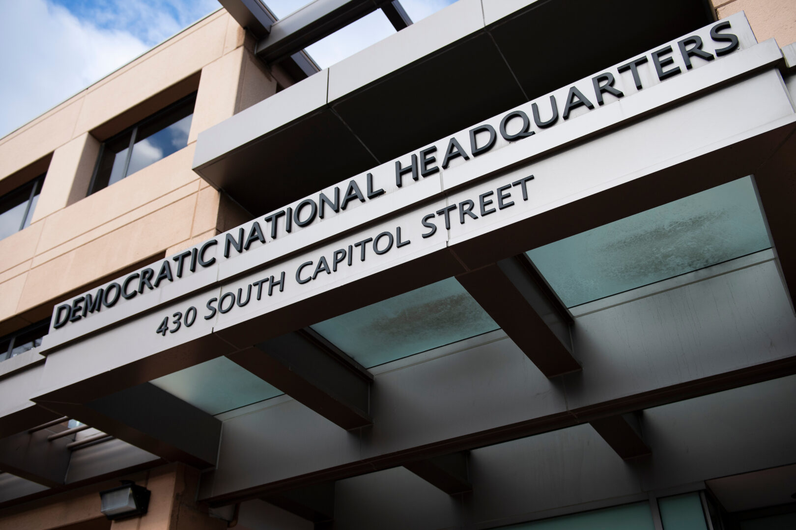 Capitol Police evacuated 10 to 15 lawmakers from Democratic National Committee headquarters Wednesday after protesters blocked the building. 