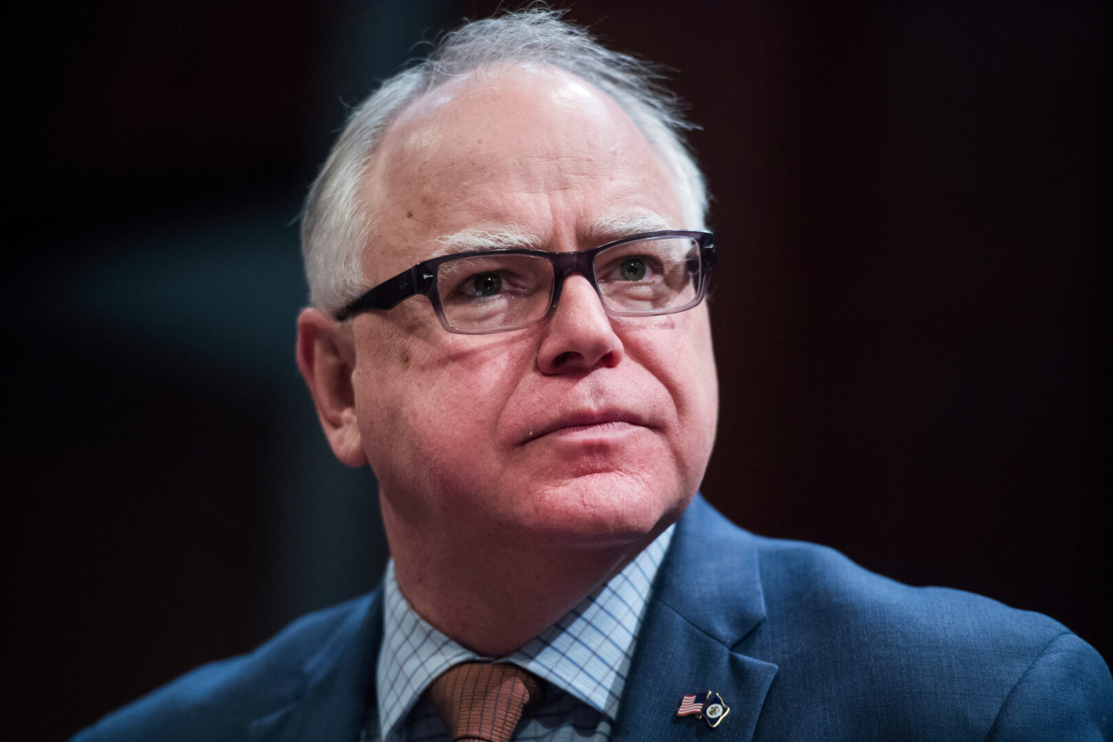 Gov. Tim Walz, D-Minn., prepares to testify at a House Transportation and Infrastructure Committee hearing in the Capitol Visitor Center on Feb. 7, 2019.