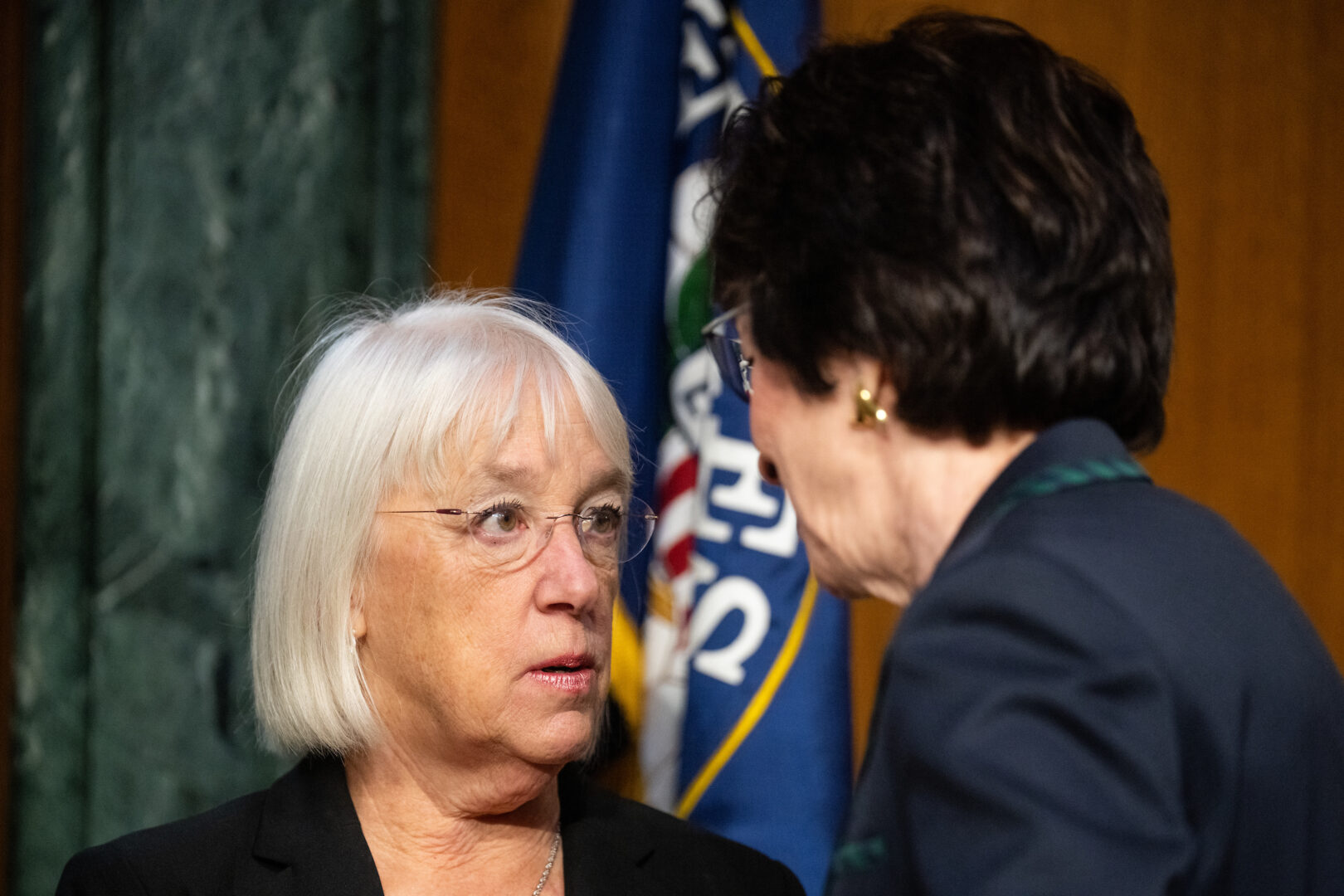 Senate Appropriations Chair Patty Murray, D-Wash., left, speaks with the panel's ranking member Susan Collins, R-Maine, before the start of the committee's hearing on the president's supplemental request on Nov. 8. 