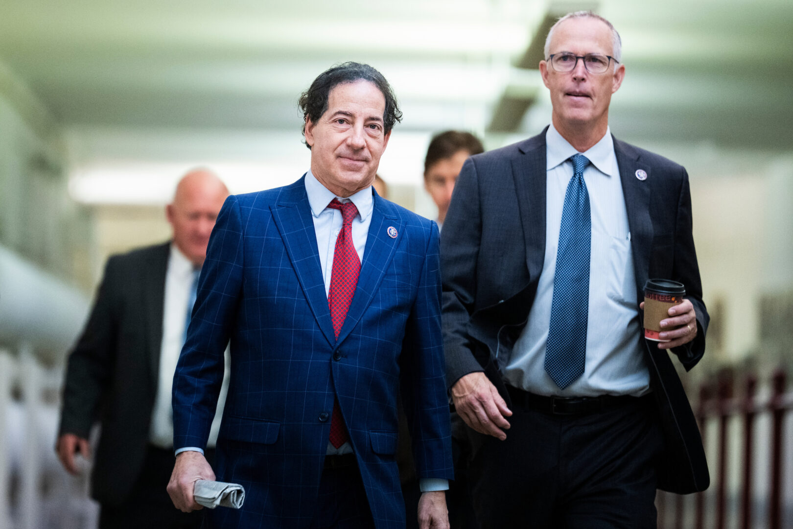 Reps. Jamie Raskin, center, and Jared Huffman are among the Democrats calling for answers about a prayer delivered by a guest chaplain in January. 