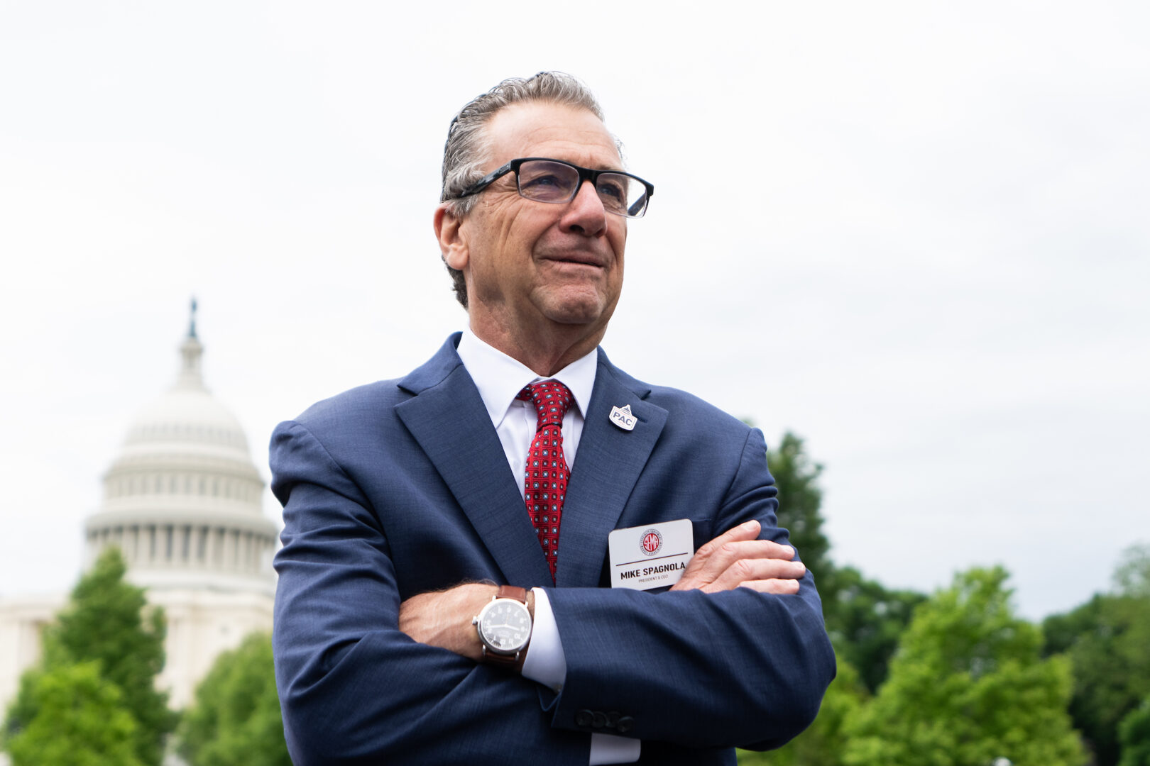 Specialty Equipment Market Association CEO Mike Spagnola looks over modified cars at SEMA’s “Cars at the Capitol” event on Capitol Hill on May 9.