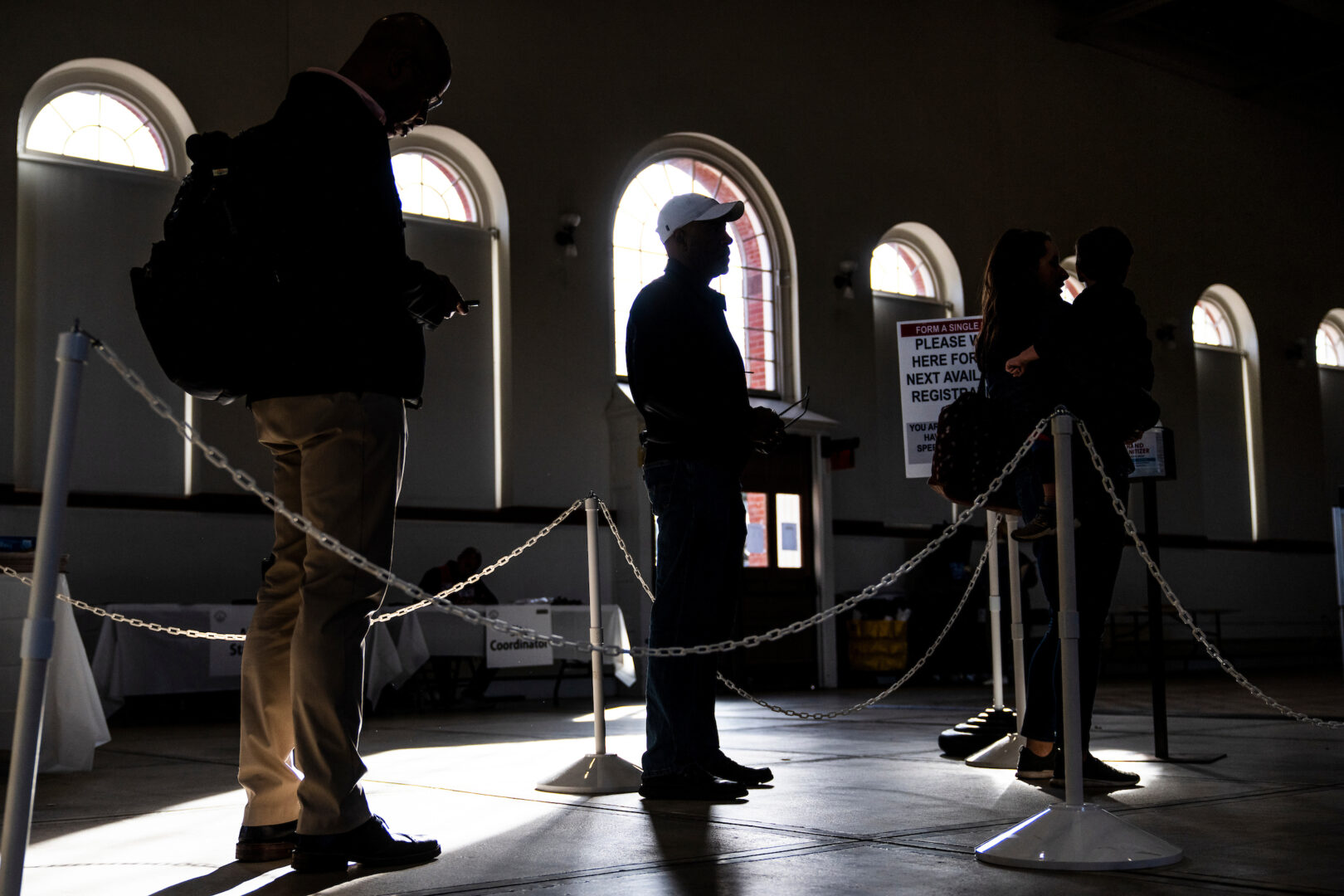 Ignorance of history makes it much easier to sell the lie that the 2020 election was stolen, Curtis writes. Above, voters in Washington, D.C., wait in line on Election Day in 2022. 