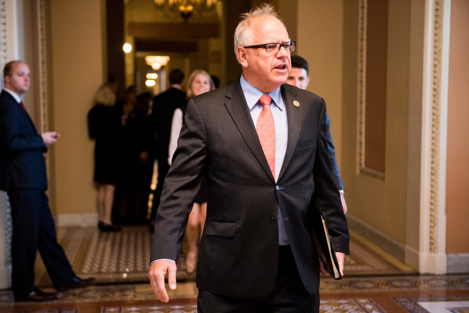 Then-Rep. Tim Walz, D-Minn., walks through the Capitol on Oct. 25, 2017. 